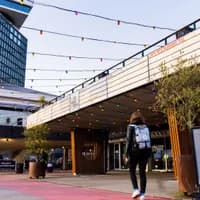 March 15th 2023 - Election day in Amsterdam. Person walking to the entrance