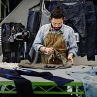 Tailor at work for sustainable fashion brand G-Star.