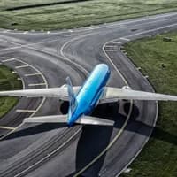 KLM Boeing 777 airplane on the runway at Schiphol Airport.