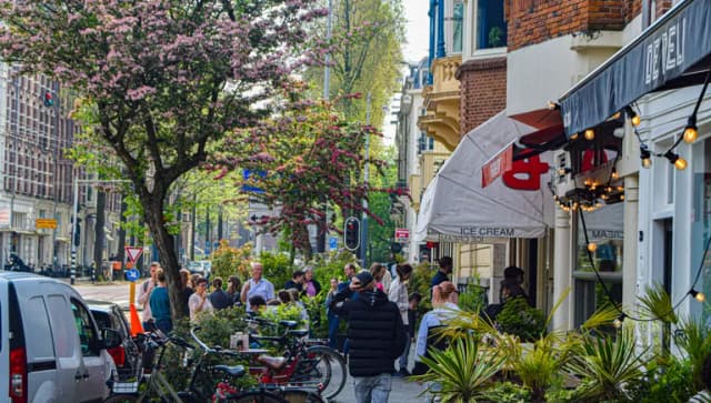 Busy street with ice cream parlour