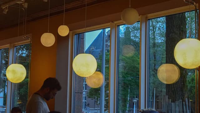 Lights and man in dining section
