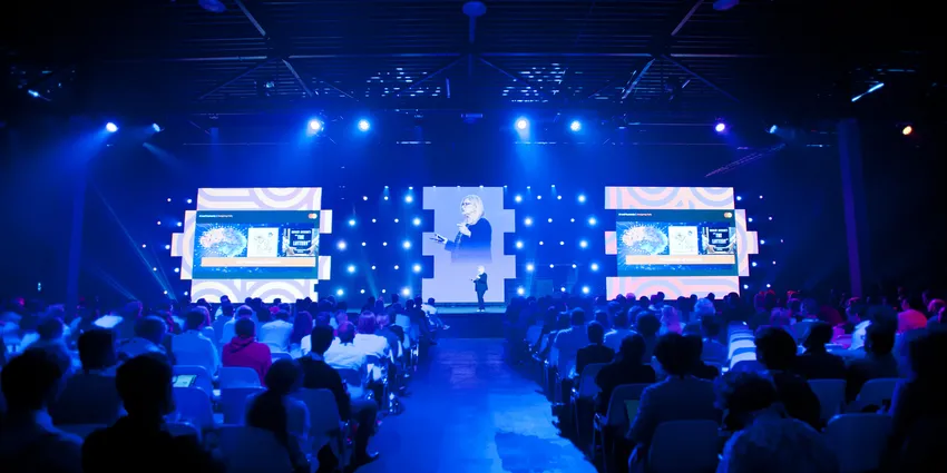 Woman giving speech, Main stage, World Summit AI 2023 conference at Taets Art and Event Park