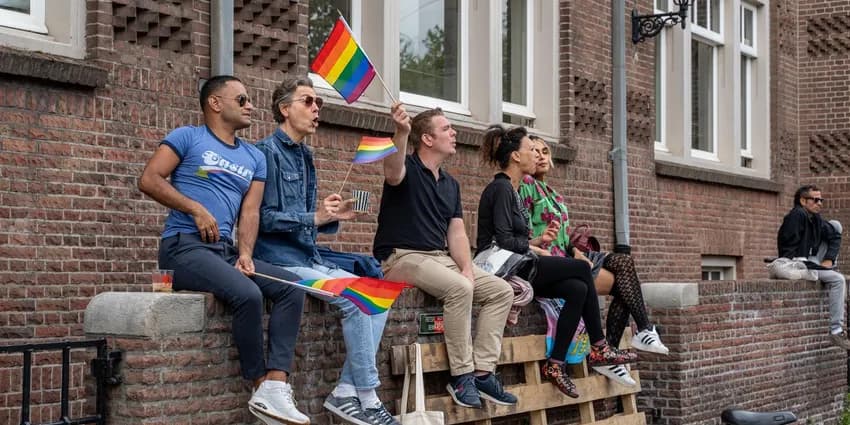 Spectators watching the Queer Walk 2023.