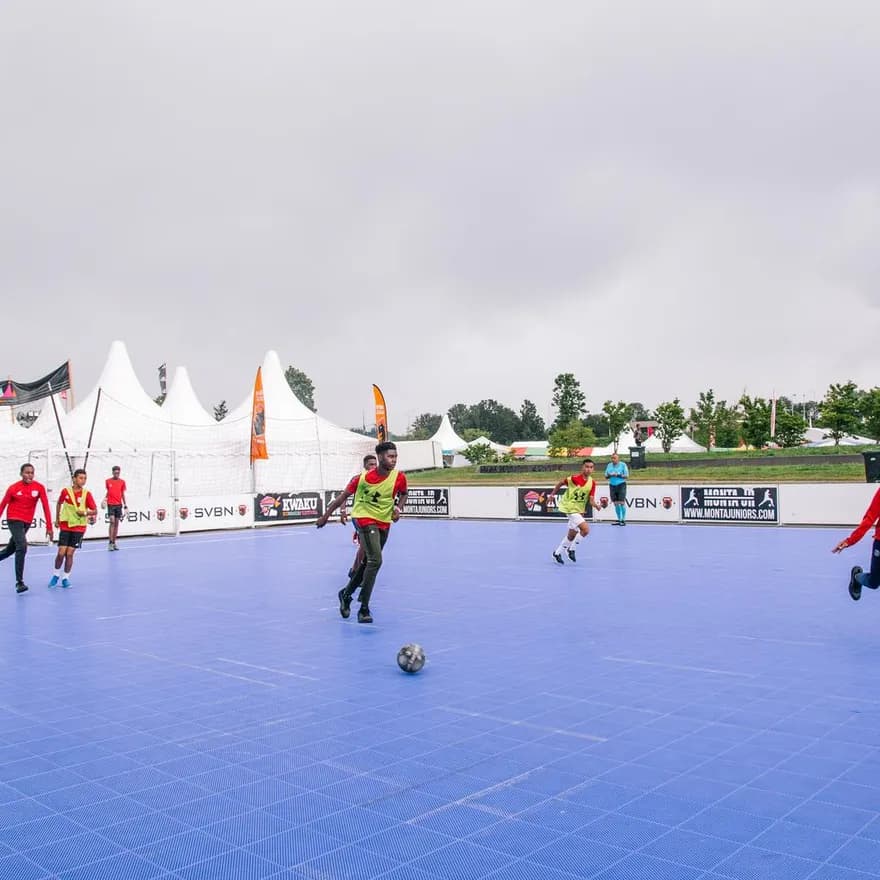 Kids playing football at Kwaku festival Nelson Mandela Park