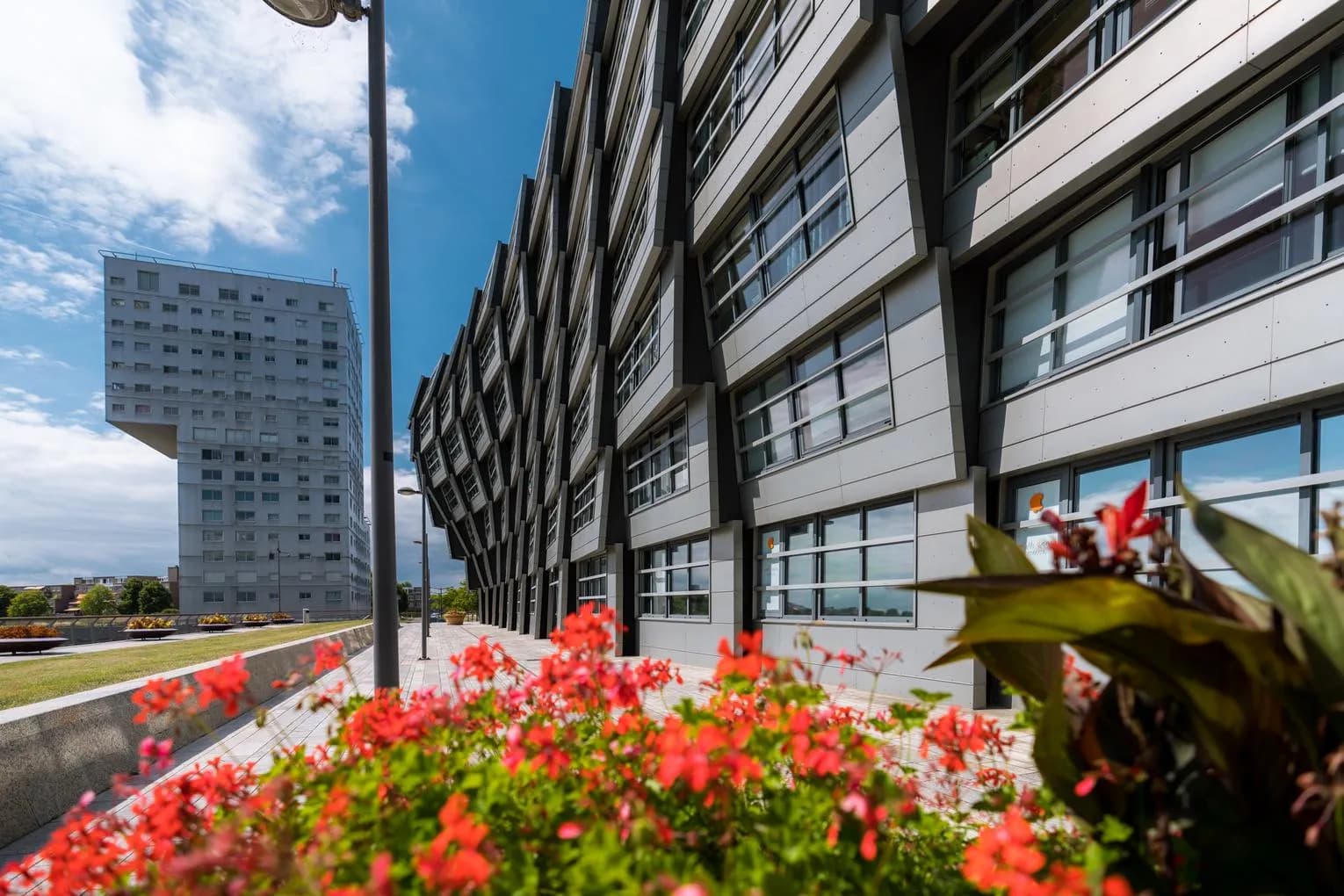 This modern flat building in Almere with living spaces is called The Wave.