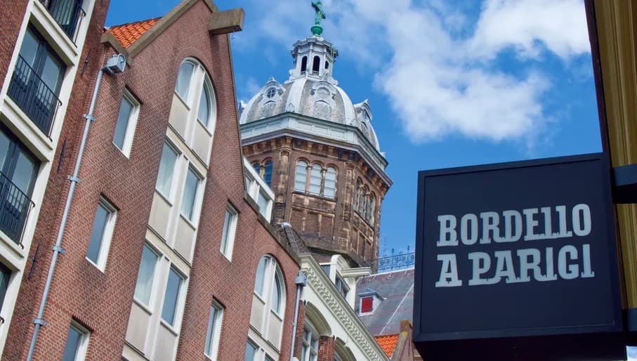 outside of shop with sign and building, outside of shop with sign and a man, inside of shop with records and record players