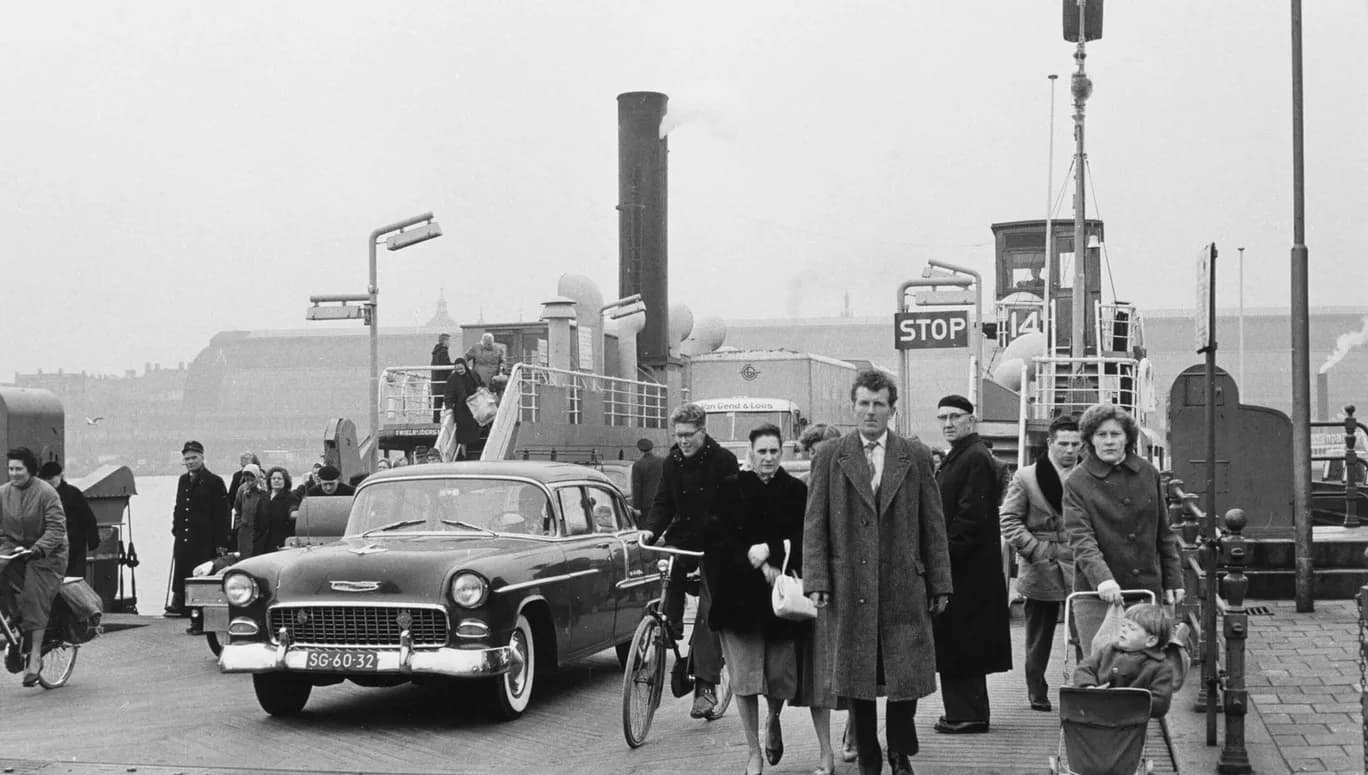 Commuters stepping of Buiksloterweg ferry in Noord archive photo