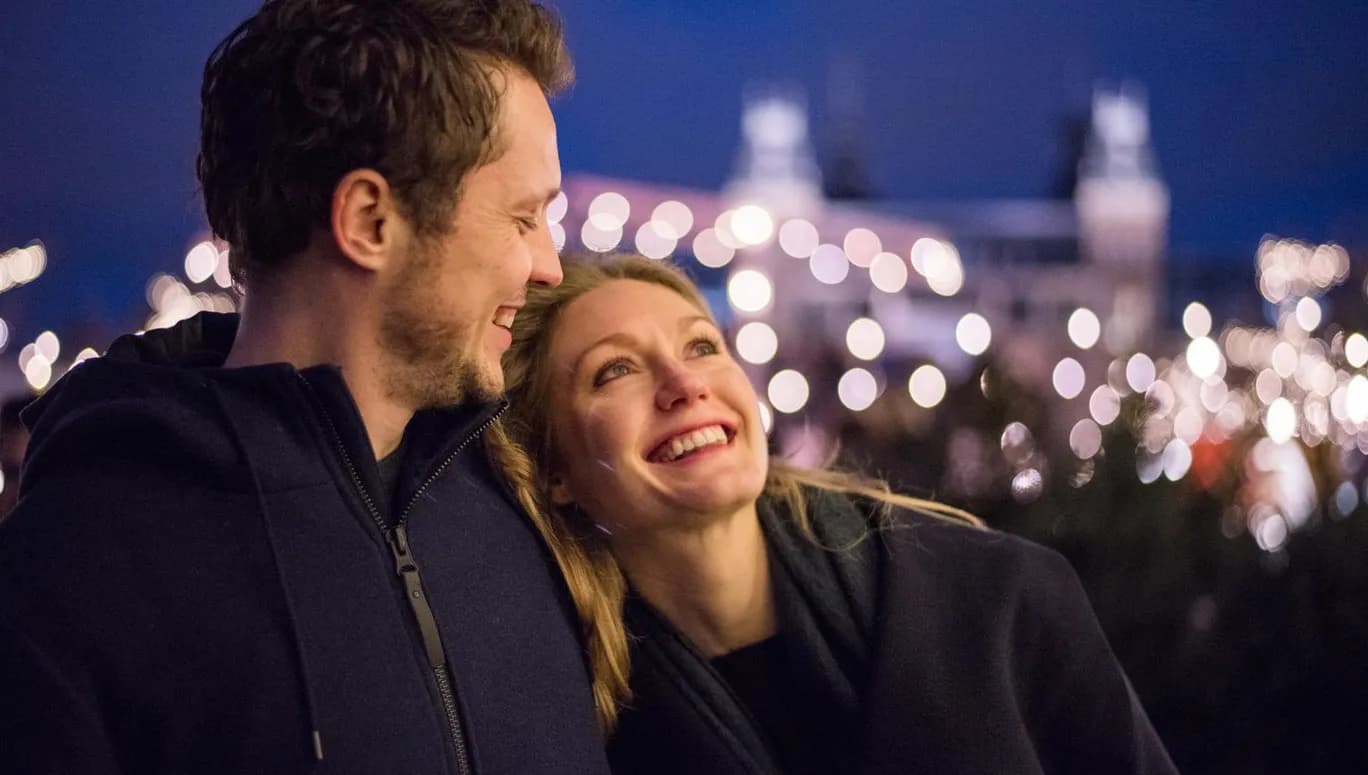 A couple hugging and smiling