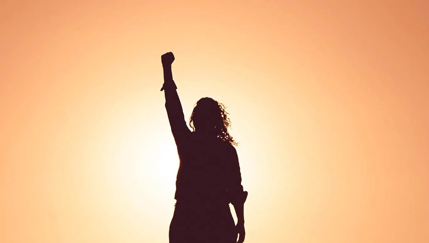 woman with a raised fist
