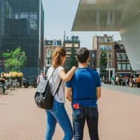 A couple at the Museumplein Stedelijk Museum