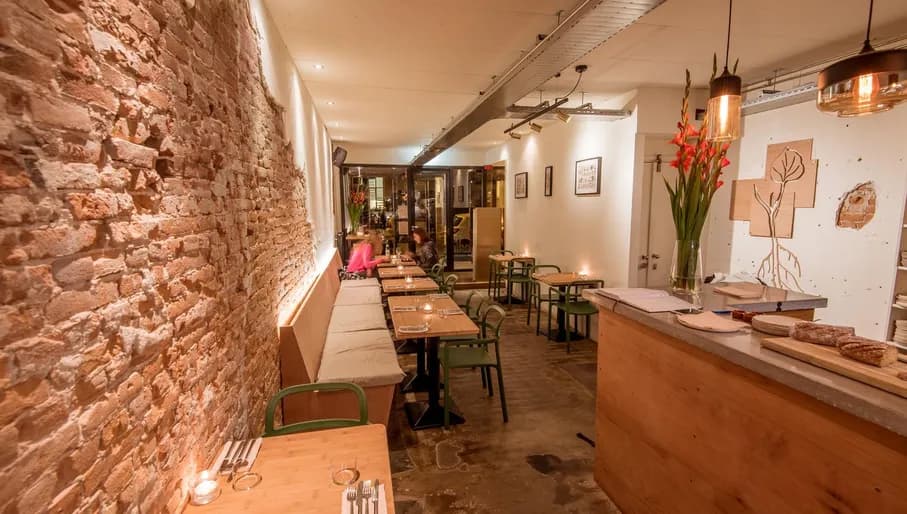 People having a drink inside Yerba